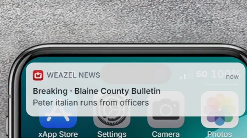 A breaking news notification from the Blaine County Bulletin on the phone lock screen